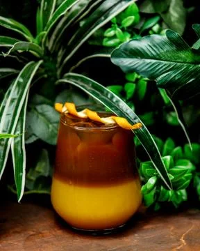 Orange cocktail on the table Stock Photos