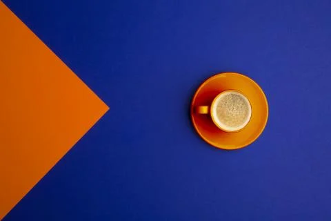 Orange coffee cup Stock Photos
