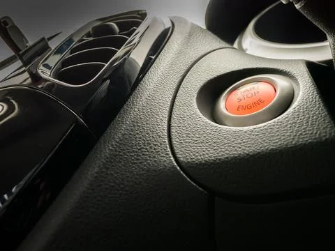 Orange color of push  button start of engine automobile Stock Photos