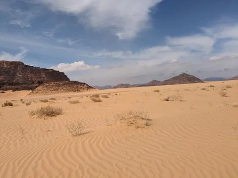 Orange color sand texture pattern background. Wadi Rum desert, Jordan,Arabia Stock Photos