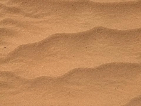Orange color sand texture pattern background. Wadi Rum desert, Jordan,Arabia Stock Photos
