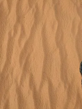 Orange color sand texture pattern background. Wadi Rum desert, Jordan,Arabia Stock Photos