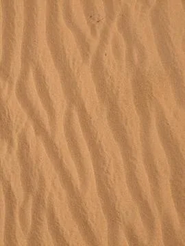 Orange color sand texture pattern background. Wadi Rum desert, Jordan,Arabia Stock Photos