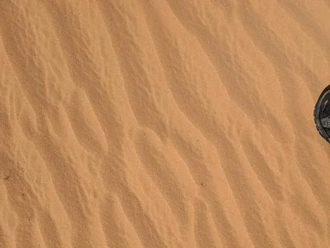 Orange color sand texture pattern background. Wadi Rum desert, Jordan,Arabia Stock Photos