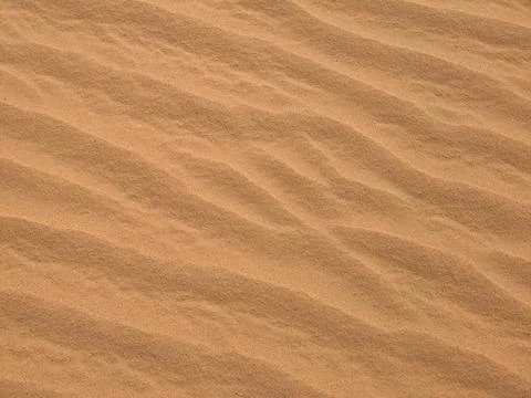 Orange color sand texture pattern background. Wadi Rum desert, Jordan,Arabia Stock Photos