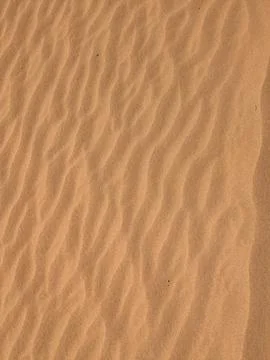 Orange color sand texture pattern background. Wadi Rum desert, Jordan,Arabia Stock Photos