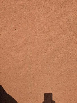 Orange color sand texture pattern background. Wadi Rum desert, Jordan,Arabia Stock Photos