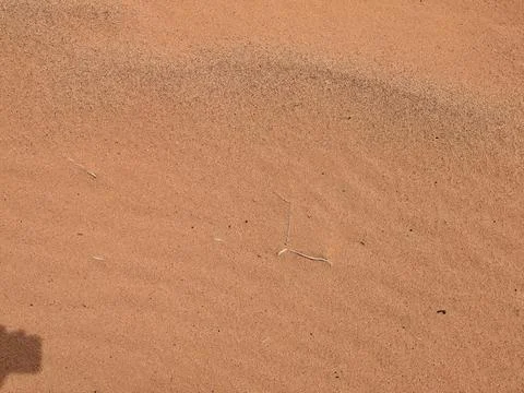 Orange color sand texture pattern background. Wadi Rum desert, Jordan,Arabia Stock Photos
