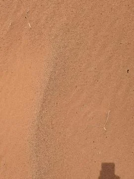 Orange color sand texture pattern background. Wadi Rum desert, Jordan,Arabia Stock Photos