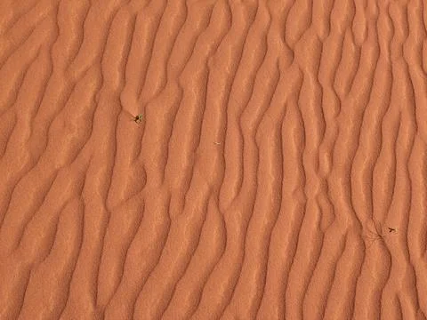Orange color sand texture pattern background. Wadi Rum desert, Jordan,Arabia Stock Photos