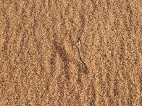 Orange color sand texture pattern background. Wadi Rum desert, Jordan,Arabia Stock Photos