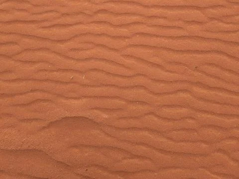 Orange color sand texture pattern background. Wadi Rum desert, Jordan,Arabia Stock Photos