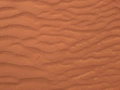 Orange color sand texture pattern background. Wadi Rum desert, Jordan,Arabia Stock Photos