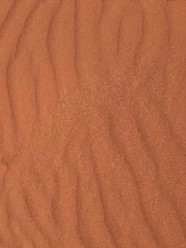 Orange color sand texture pattern background. Wadi Rum desert, Jordan,Arabia Stock Photos