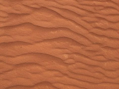 Orange color sand texture pattern background. Wadi Rum desert, Jordan,Arabia Stock Photos