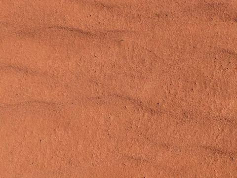 Orange color sand texture pattern background. Wadi Rum desert, Jordan,Arabia Stock Photos