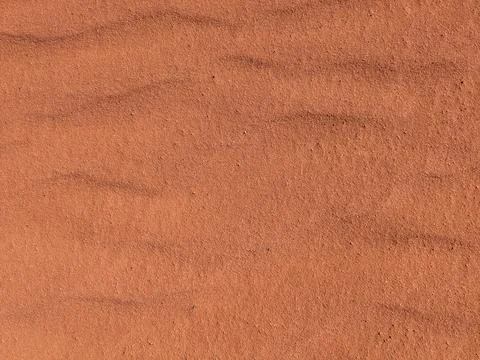 Orange color sand texture pattern background. Wadi Rum desert, Jordan,Arabia Stock Photos