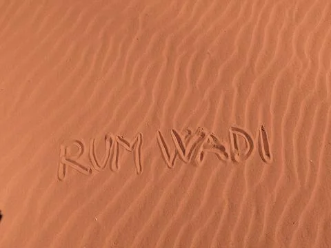 Orange color sand texture pattern background. Wadi Rum desert, Jordan,Arabia Stock Photos