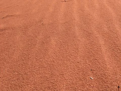 Orange color sand texture pattern background. Wadi Rum desert, Jordan,Arabia Stock Photos
