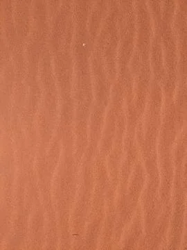 Orange color sand texture pattern background. Wadi Rum desert, Jordan,Arabia Stock Photos