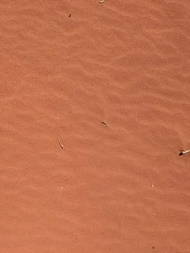 Orange color sand texture pattern background. Wadi Rum desert, Jordan,Arabia Stock Photos