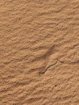 Orange color sand texture pattern background. Wadi Rum desert, Jordan,Arabia Stock Photos