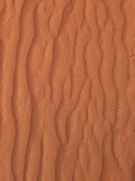 Orange color sand texture pattern background. Wadi Rum desert, Jordan,Arabia Stock Photos