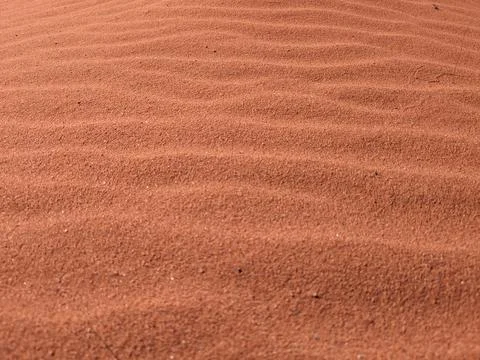 Orange color sand texture pattern background. Wadi Rum desert, Jordan,Arabia Stockfoto's