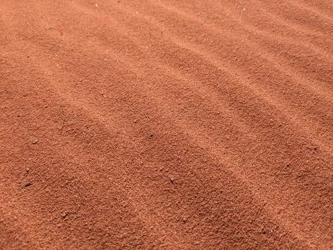 Orange color sand texture pattern background. Wadi Rum desert, Jordan,Arabia Stock Photos