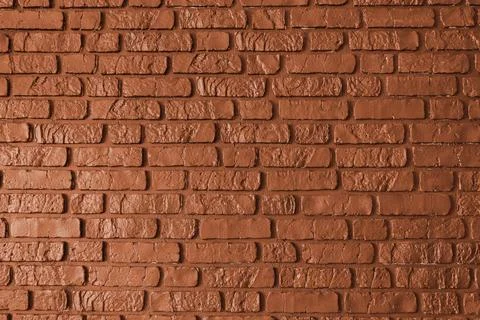 Orange colored brick wall texture, architecture building, masonry of stone .. Stock Photos