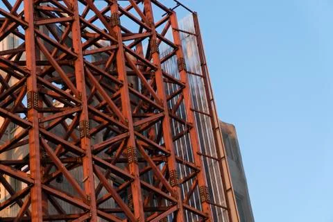 Orange colored metal scaffolding outside of a building Stock Photos