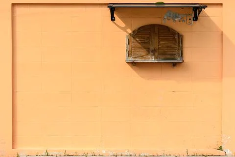 Orange colored wall Stock Photos