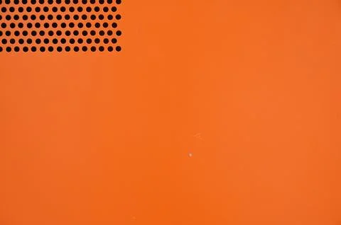 Orange computer cpu texture background with black hole Foto stock