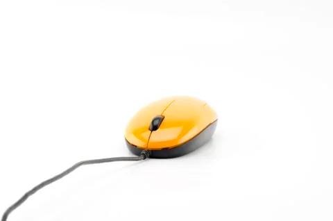 Orange computer mouse on white background Stock Photos