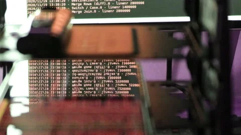 Orange computer software code moving on a black monitor reflect on glass. Abs 스톡 동영상 143871757