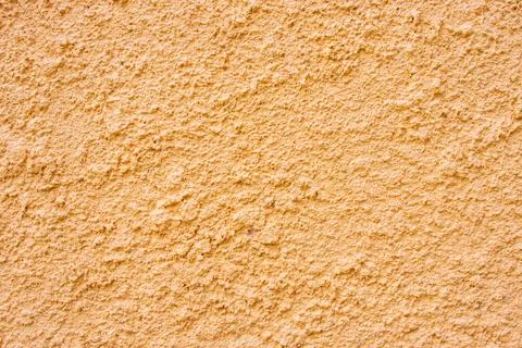 Orange concrete wall texture for background and construction Stock Photos