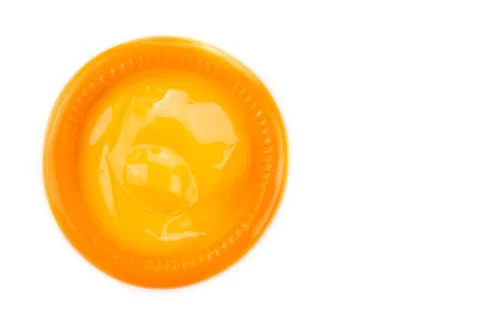 Orange condom Stock Photos