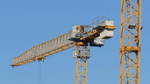 Orange construction cranes, Blue sky, Bremen, Germany, Europe Stock Footage 124253058