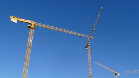 Orange construction cranes, Blue sky, Bremen, Germany, Europe Stock Footage 124253631