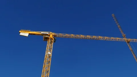 Orange construction cranes, Blue sky, Bremen, Germany, Europe Stock Footage 124254465
