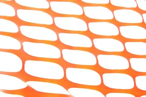 Orange construction site net. orange safety net. orange net. Stock Photos