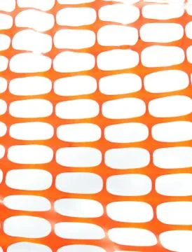 Orange construction site net. orange safety net. orange net. Stock Photos