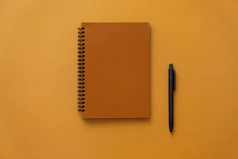 Orange craft notebook Stock Photos