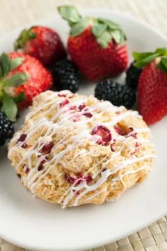 Orange Cranberry Scone with fresh fruit Stock Photos
