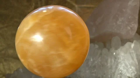 Orange crystal ball Stock Footage 7749141