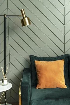 Orange cushion on a sofa retro interior design Stock Photos