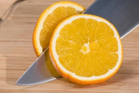 Orange cut into slices. Stock Photos