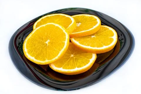Orange cut on a white background. Stock Photos