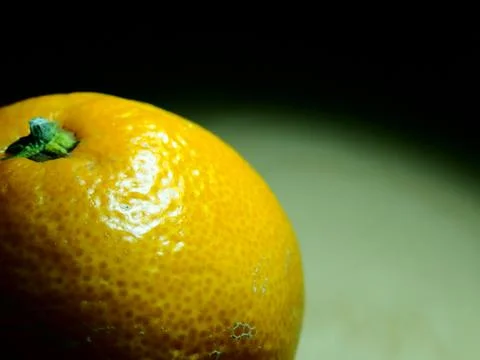 Orange in the dark 库存照片