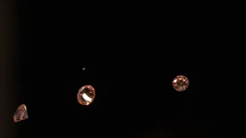Orange Diamond in slow motion 4K Stock Footage 253148876